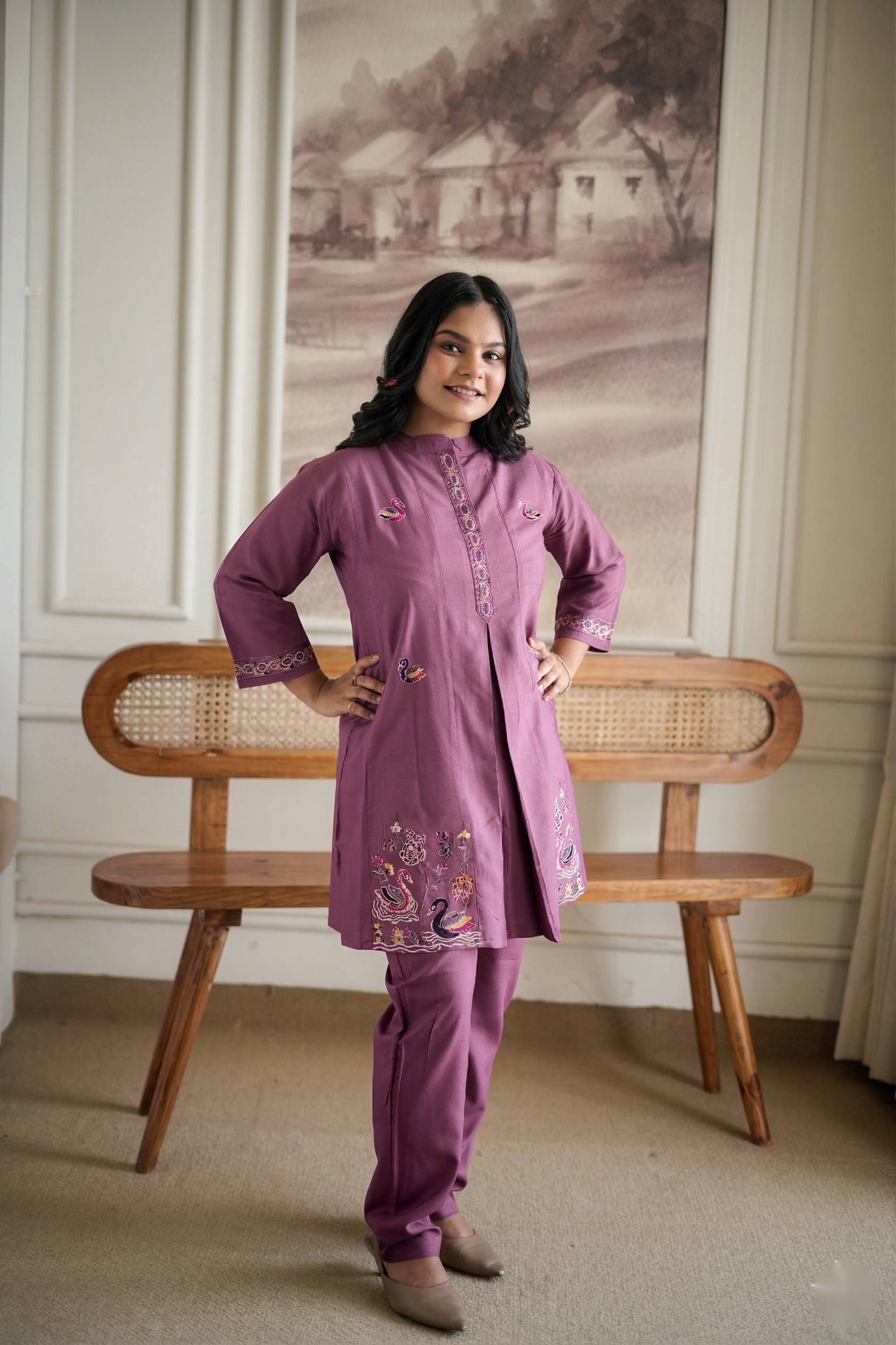 Mauve Straight Kurta with Intricate Swan & Floral Embroidery Paired with Matching Pants