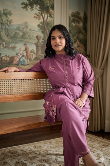 Mauve Straight Kurta with Intricate Swan & Floral Embroidery Paired with Matching Pants